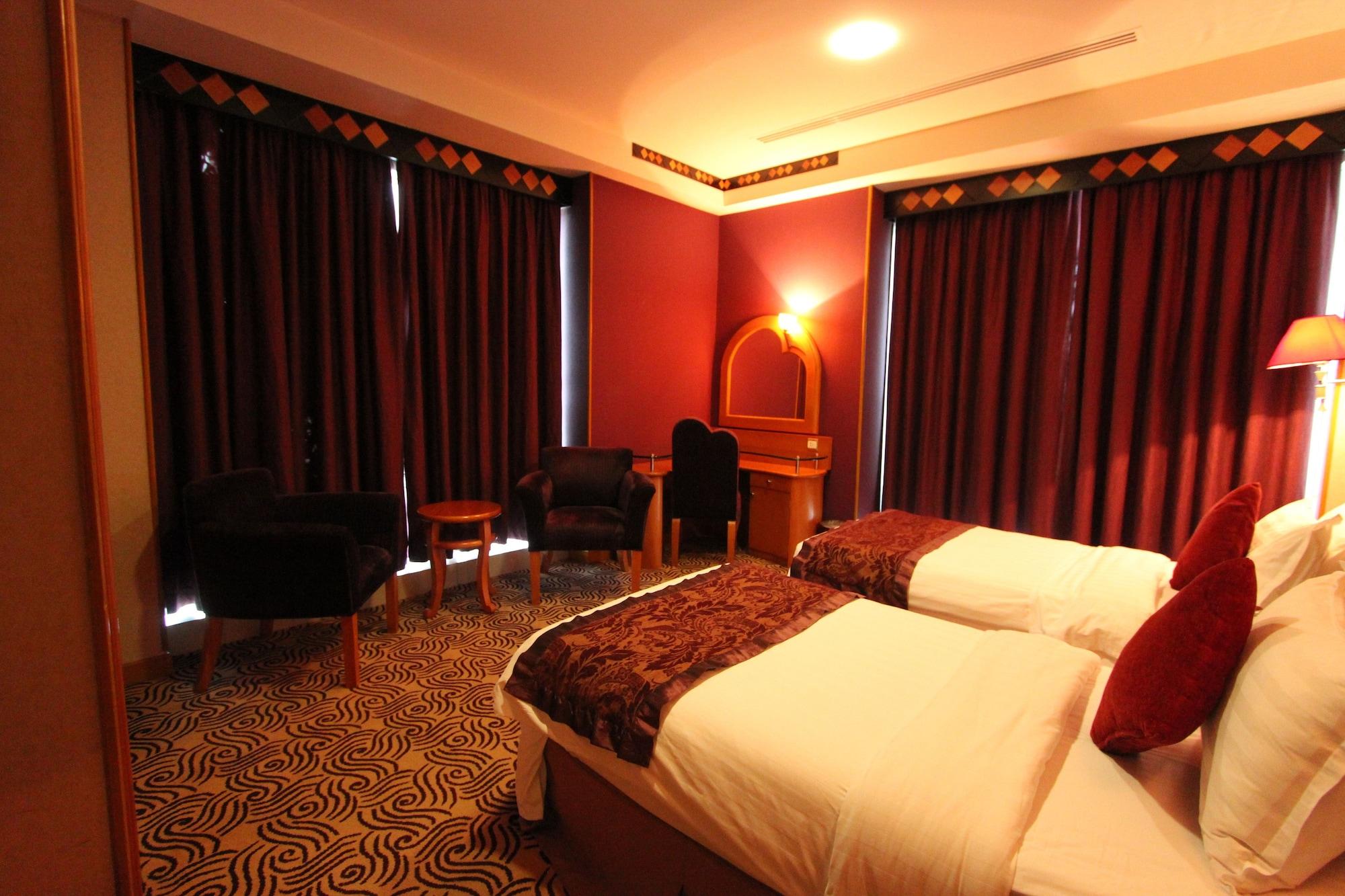 Awaliv International Hotel Ta'if Exterior foto A room at the hotel