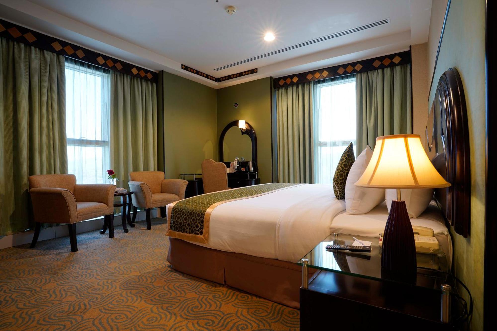 Awaliv International Hotel Ta'if Zimmer foto A bedroom at the hotel