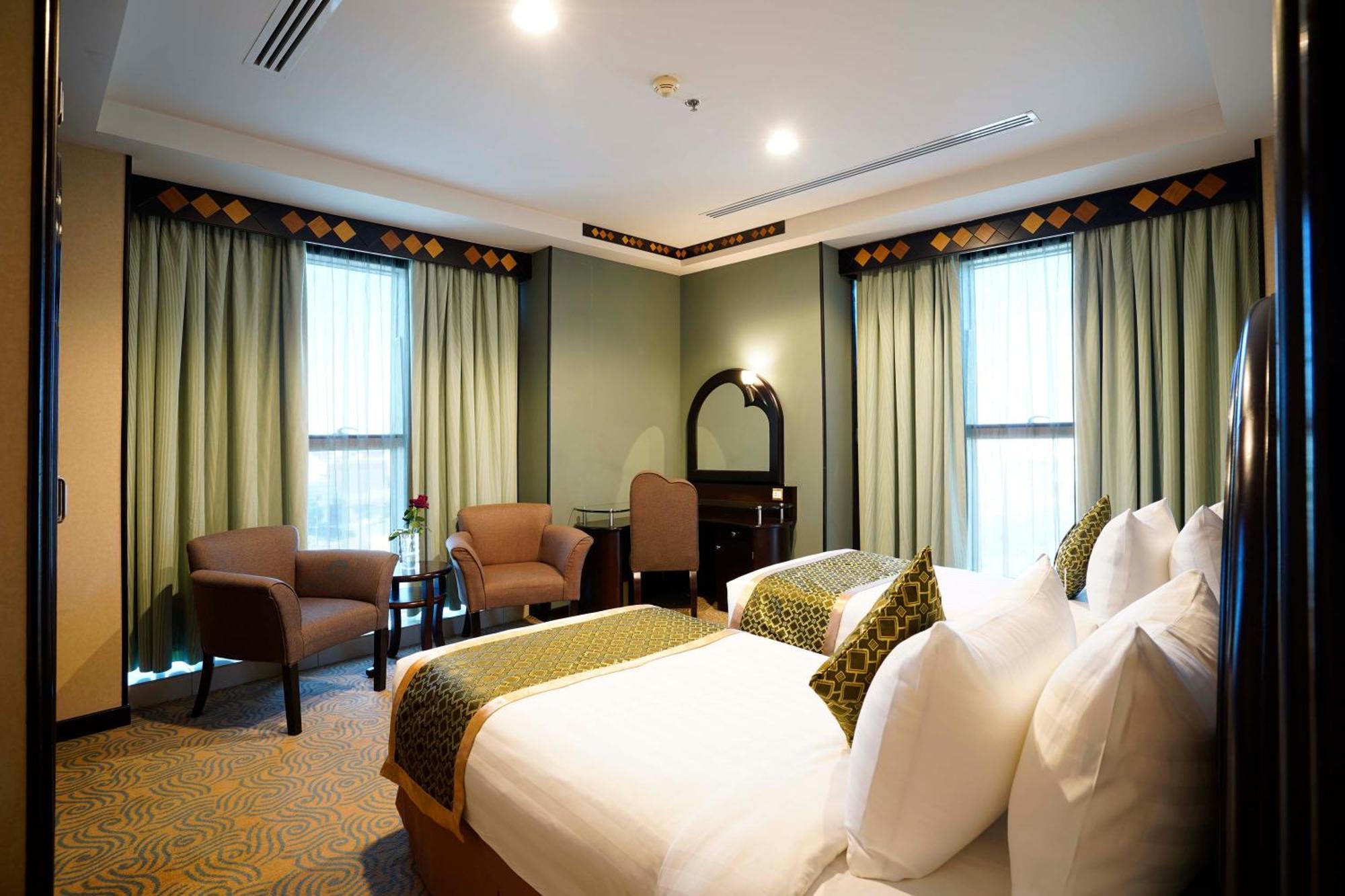 Awaliv International Hotel Ta'if Zimmer foto A bedroom at the hotel