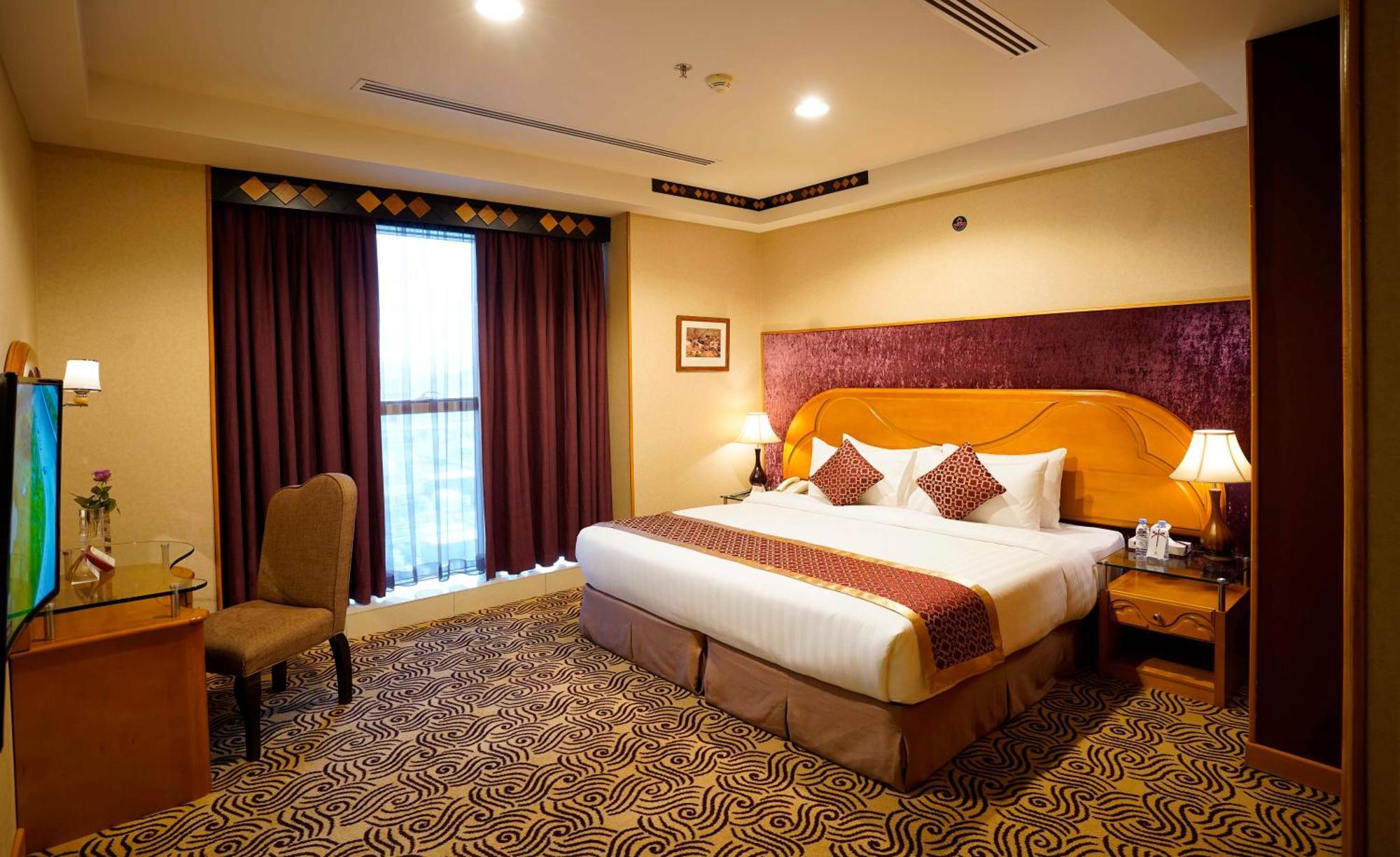 Awaliv International Hotel Ta'if Zimmer foto A bedroom at the hotel